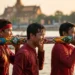 Joyful boat racing team at Cambodia's Bon Om Touk (Water Festival), a major event in the national holiday guide.